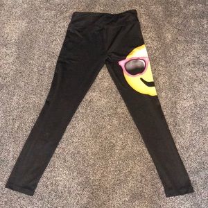 One pair of emoji styled leggings.